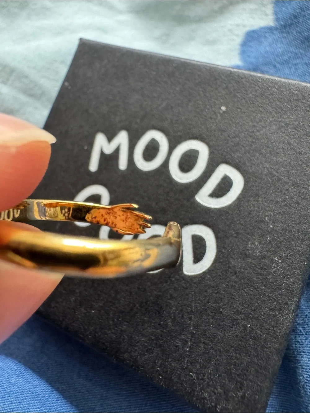 Mood Good / Good Daze hand hugging ring
